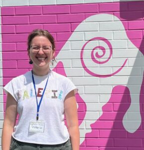 Picture of Valerie Locke - Museum Associate - standing in front of museum.