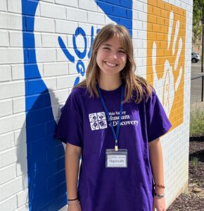 Picture of Hannah Kloppman - Museum Assistant - Standing in front of museum